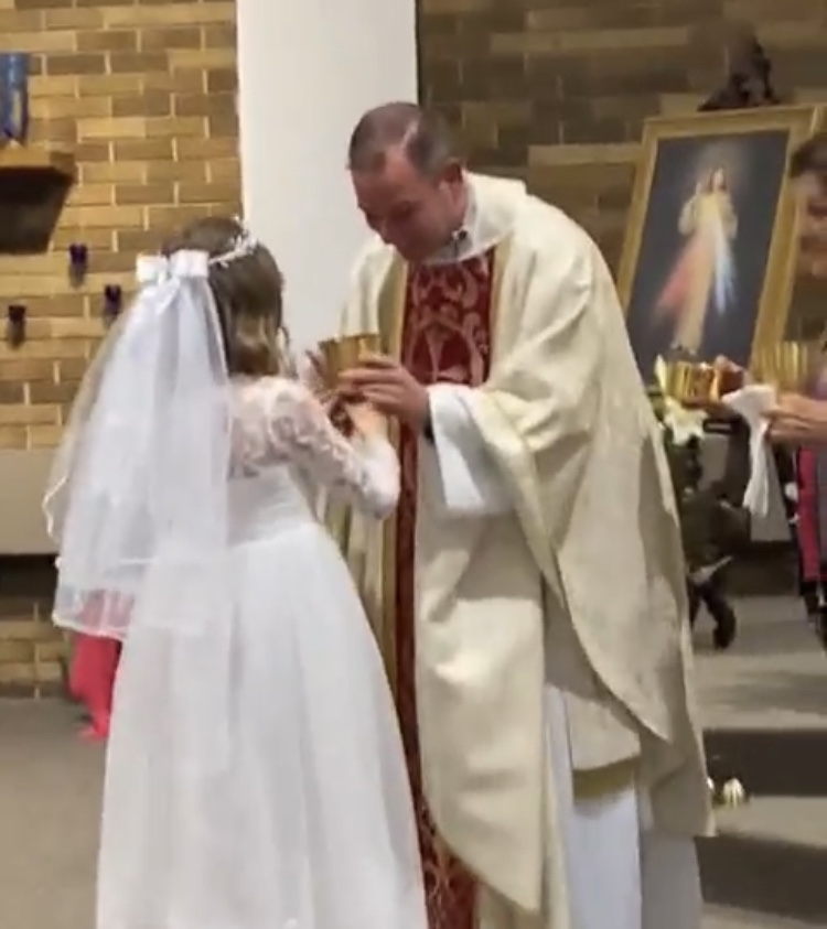 Little Girl Chugs Wine At Her First Holy Communion Leaving The Congregation In Tears