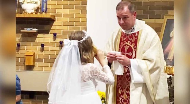 Little Girl Chugs Wine At Her First Holy Communion Leaving The Congregation In Tears