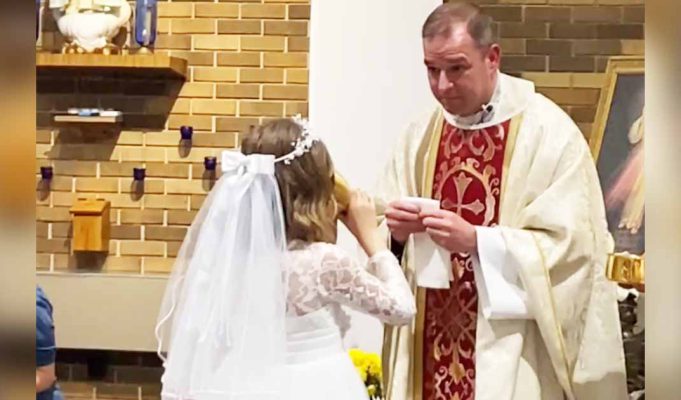 Little Girl Chugs Wine At Her First Holy Communion Leaving The Congregation In Tears