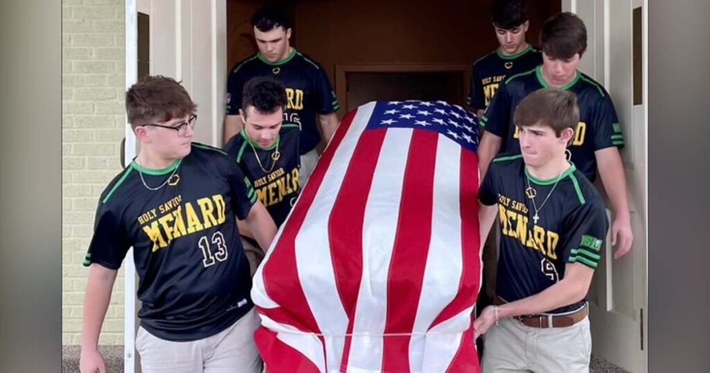 High school seniors carry the casket of a U.S. Air Force veteran who had no family