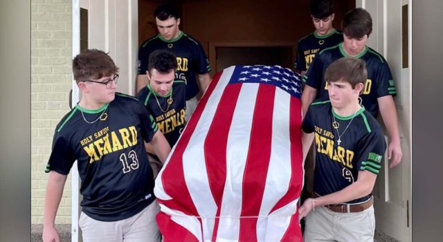 High school seniors carry the casket of a U.S. Air Force veteran who had no family