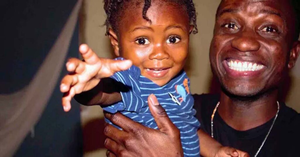 Young man takes custody of boy found in trash in Haiti and nurtures him to health