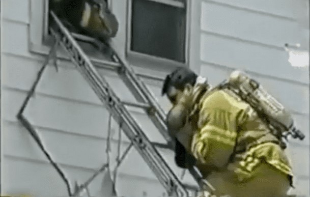 A firefighter saves baby's life by performing CPR while rapidly descending the ladder