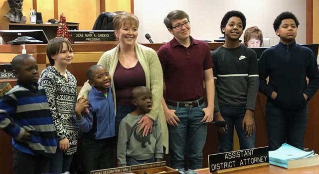 Single mom of 2 raised in foster care adopts 6 siblings so they can grow up together