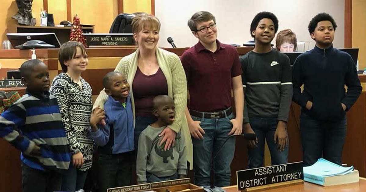 Single mom of 2 raised in foster care adopts 6 siblings so they can grow up together