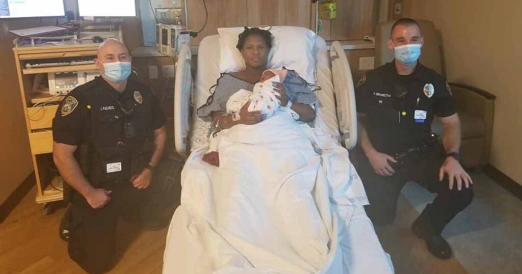 Two police officers help deliver a baby in parking lot after mom couldn’t make it to hospital