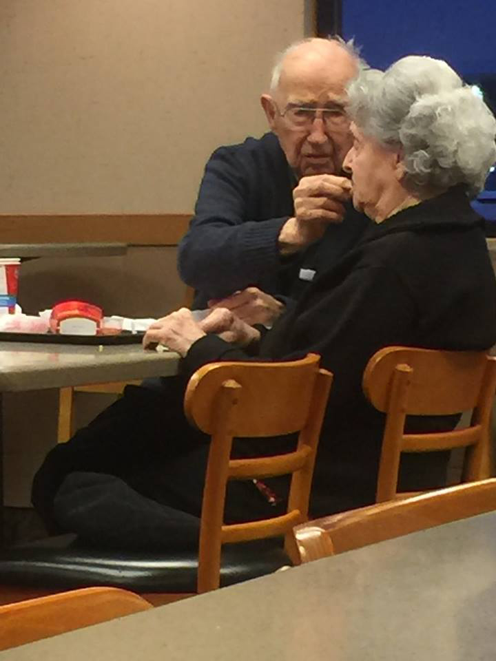 Photo of a 96-year-old husband feeding his wife who has Alzheimer's proves lifelong love exists