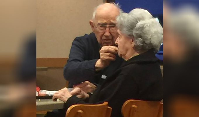 Photo of a 96-year-old husband feeding his wife who has Alzheimer's proves lifelong love exists