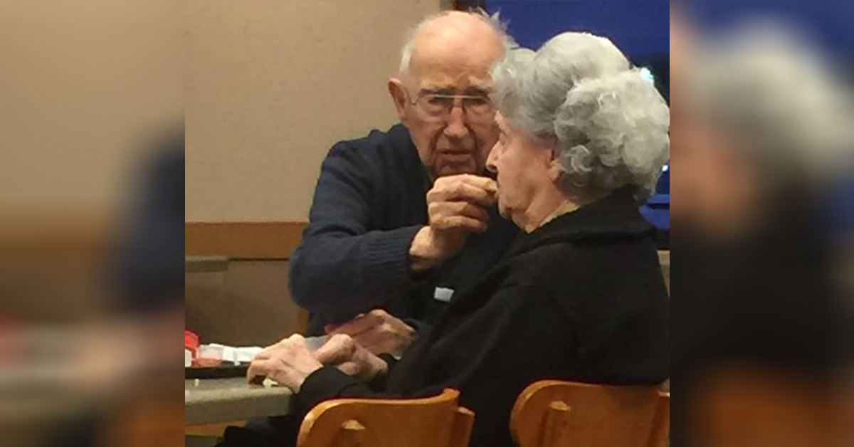 Photo of a 96-year-old husband feeding his wife who has Alzheimer's proves lifelong love exists