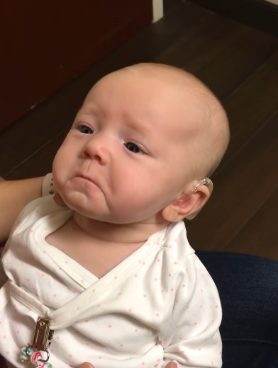 Deaf baby is joyous when she hears mum say "I love you" for the first time