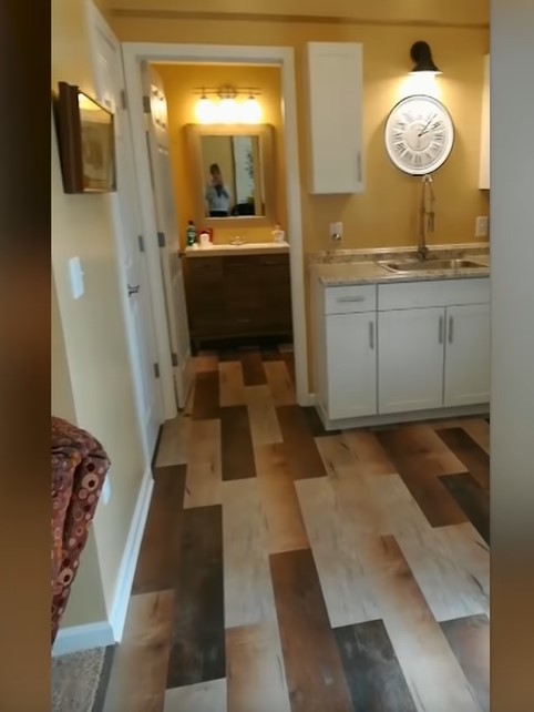 Son surprises parents after turning his basement rec room into a refurbished suite for them to live in