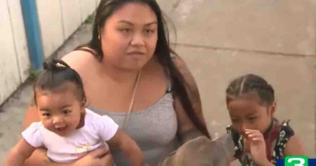 Pit bull grabs baby by diaper and starts to pull her—shortly after the family realizes why she’s a hero