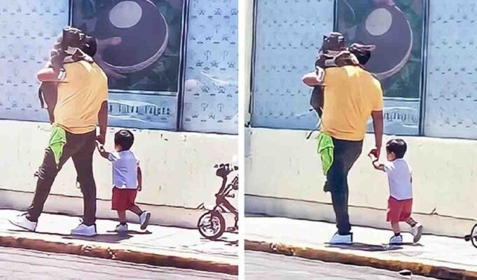 Father gets praised for choosing to carry his large dog instead his little kid