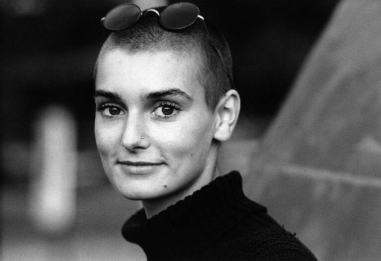 Sinéad O'Connor performing on stage