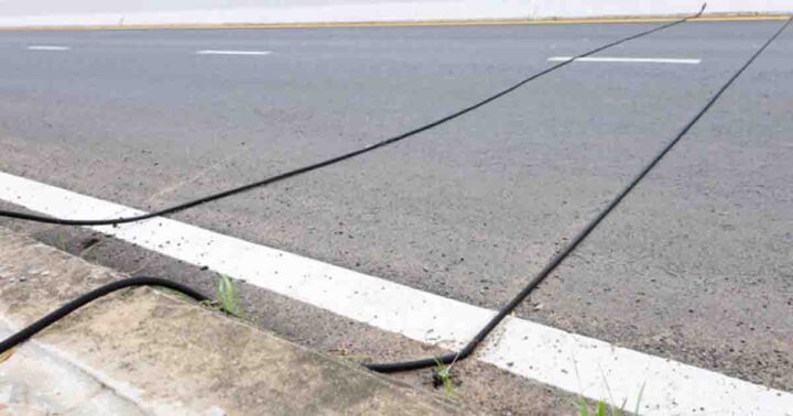 Here's the purpose of those weird black cables you see on the road