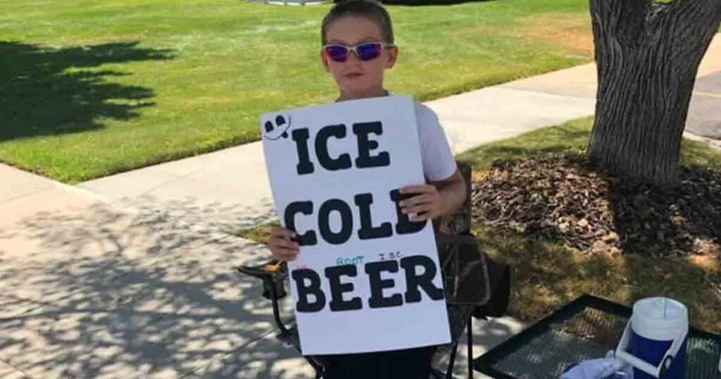 Police called on boy selling ‘ice cold beer,’ but his clever sign leaves them laughing