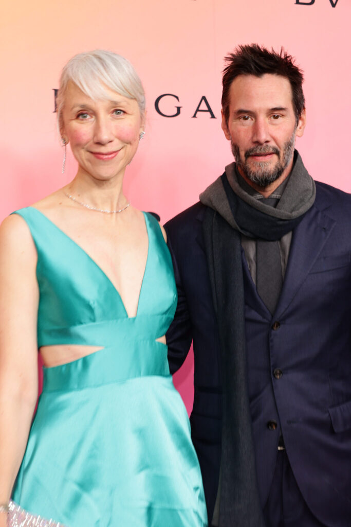 Keanu Reeves' girlfriend, 54, sparks mixed reactions with teal cut-out dress on the red carpet