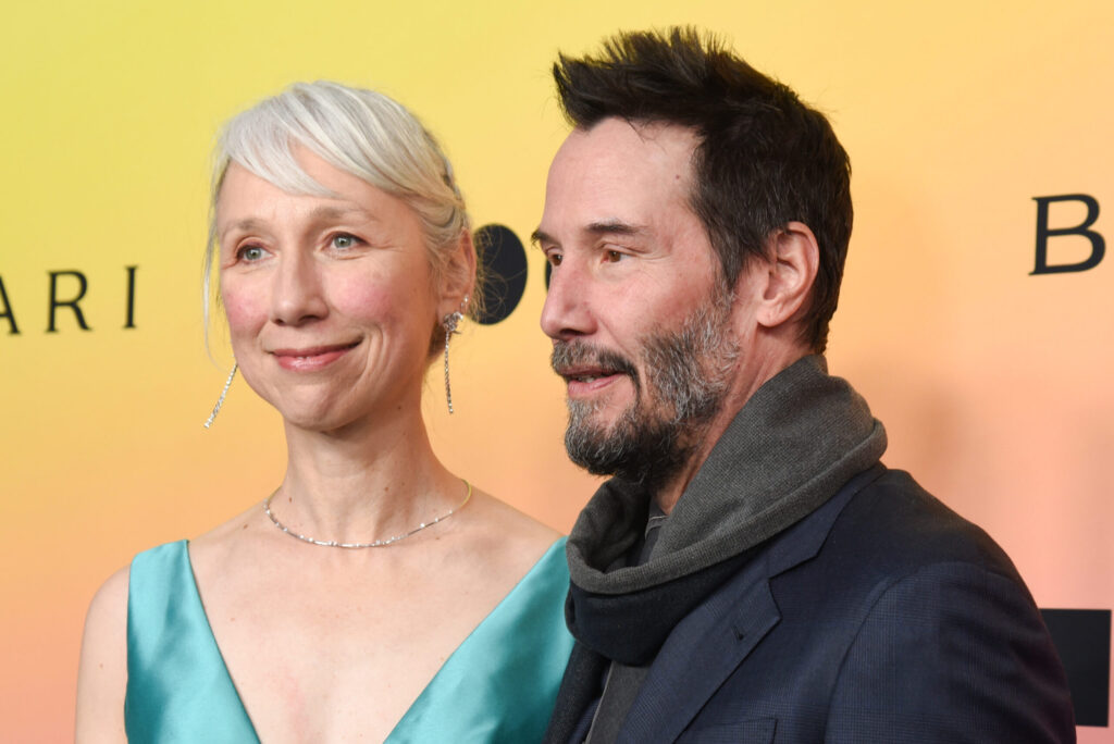 Keanu Reeves' girlfriend, 54, sparks mixed reactions with teal cut-out dress on the red carpet