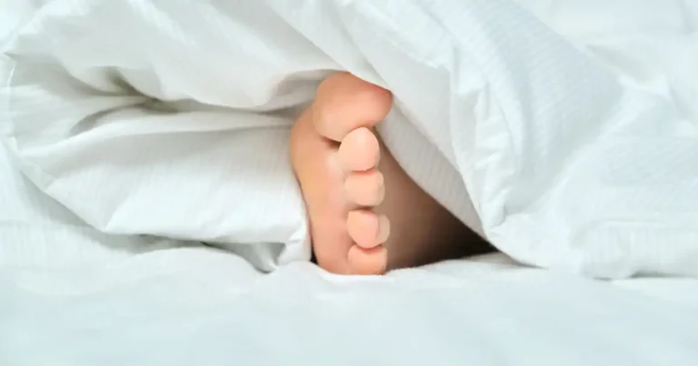 Why sleeping with one foot out might help you fall asleep faster