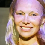 Pamela Anderson revisits her iconic 1990s glam look, surprising fans after years of going makeup-free